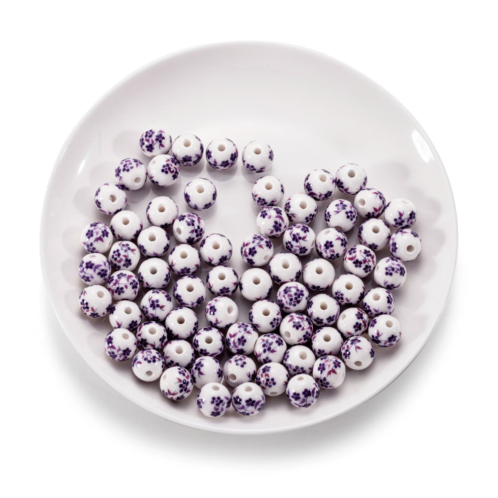 Al por mayor 10pcs/paquete de colgantes de ciruela de cerámica de estilo chino cuentas de cuerda de bricolaje de bricolaje